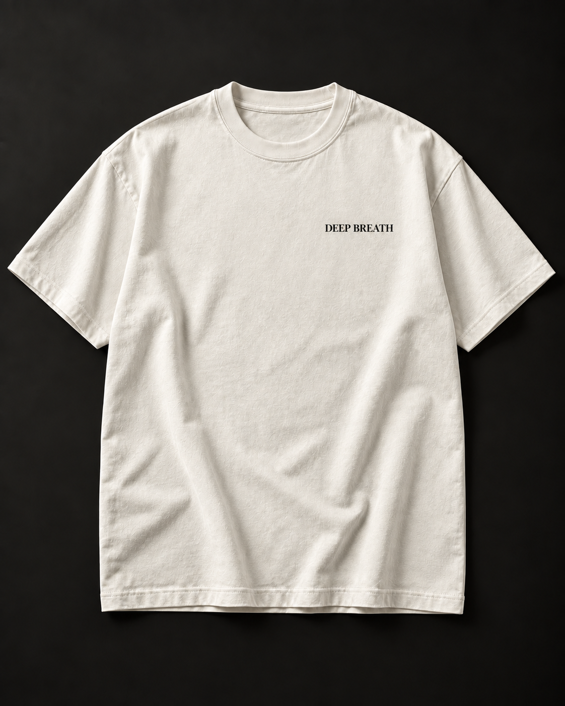DEEP BREATH heavyweight tee in vintage white with a small serif left chest print.