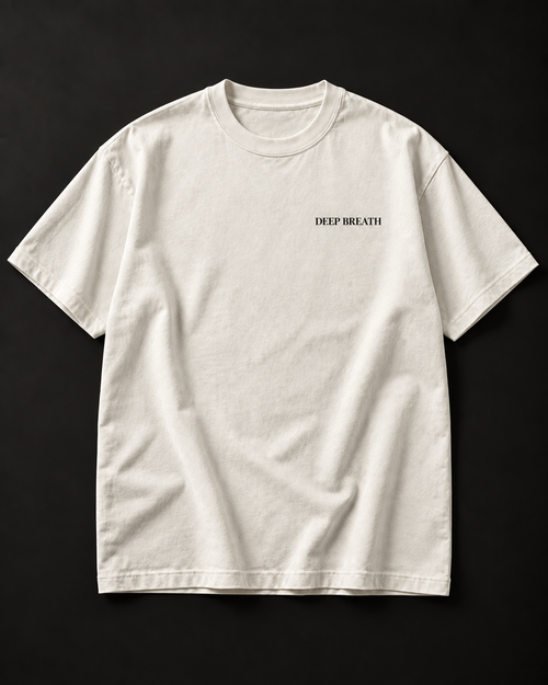 DEEP BREATH heavyweight tee in vintage white with a small serif left chest print.